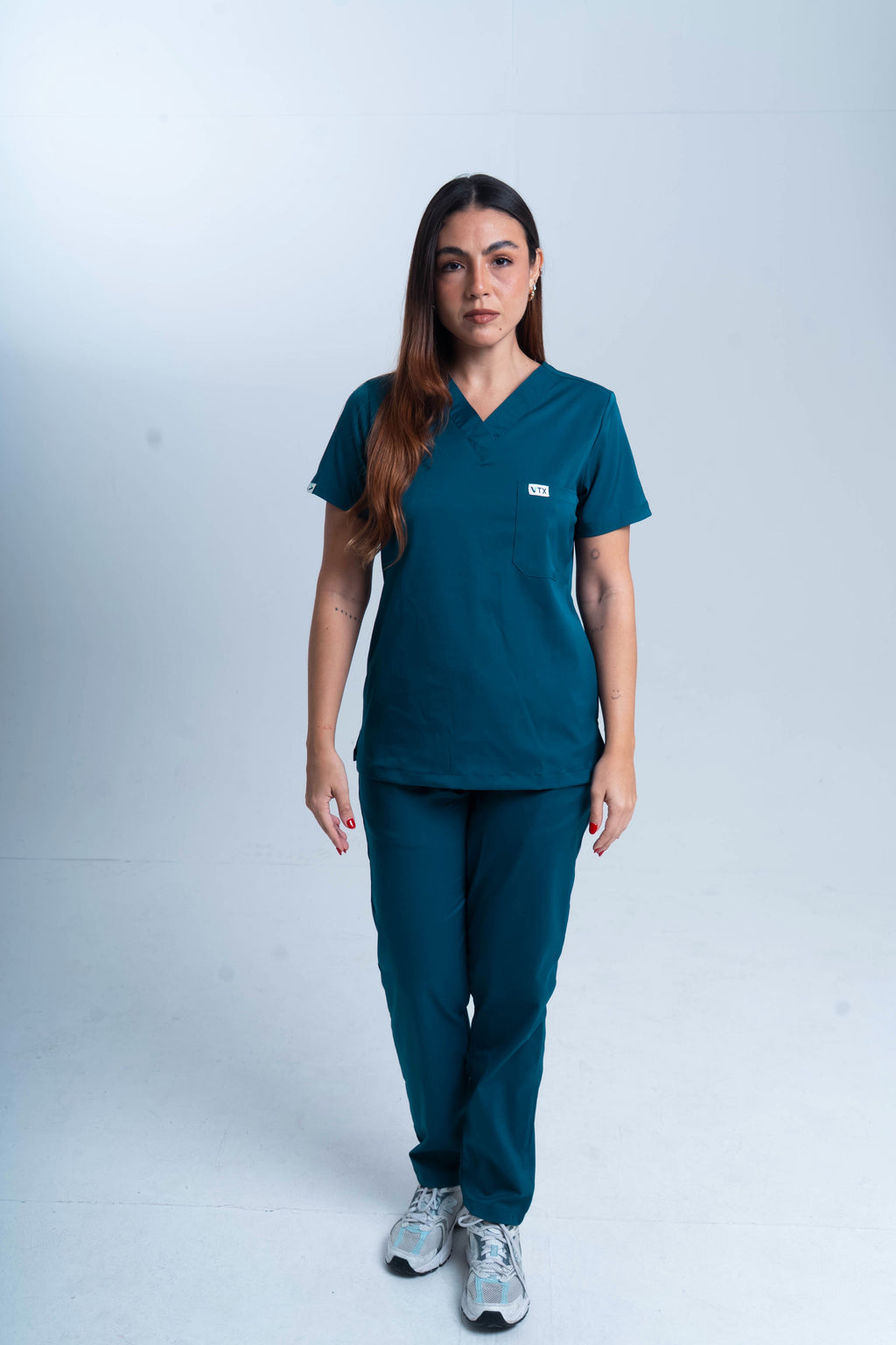 Scrub azul petroleo mujer
